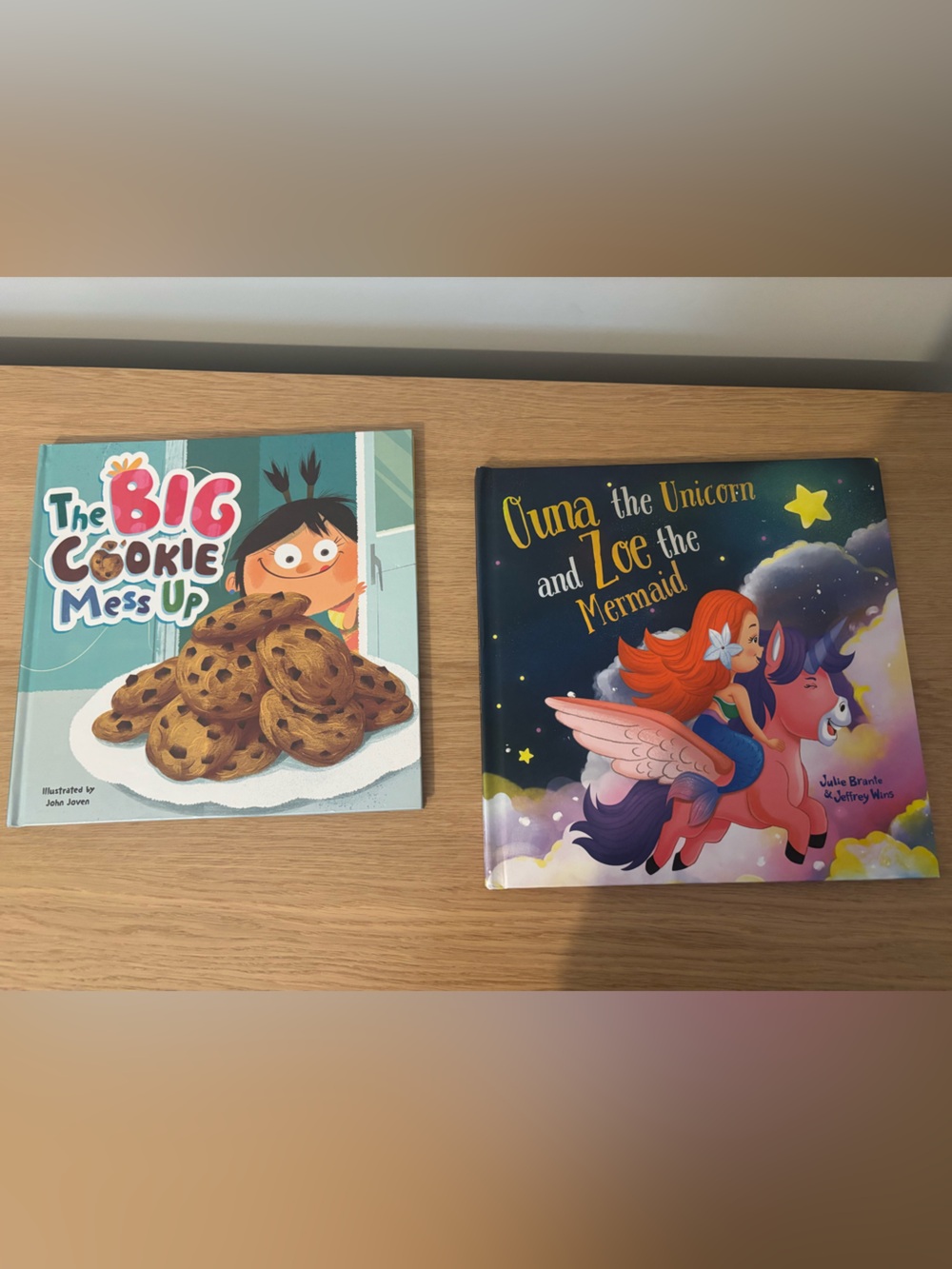 The big cookie mess up book and ouna unicorn and Zoe mermaid